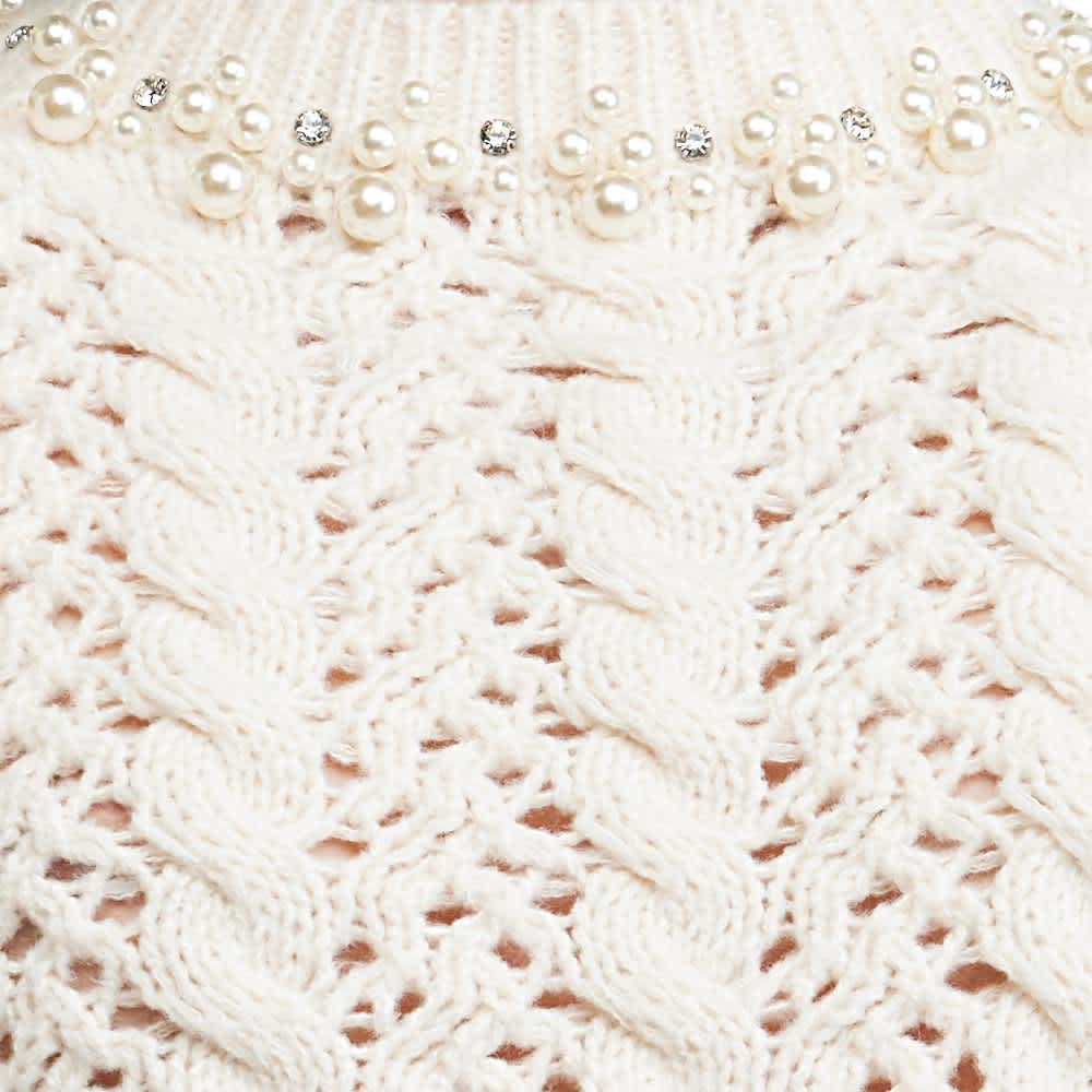 SUÉTER APLICACIONES